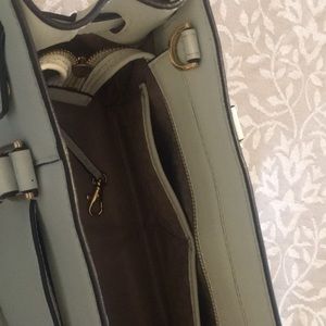 Very gently used Michael Kors Satchel with crossbody strap